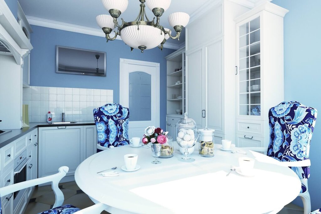 White kitchen with blue wallpaper