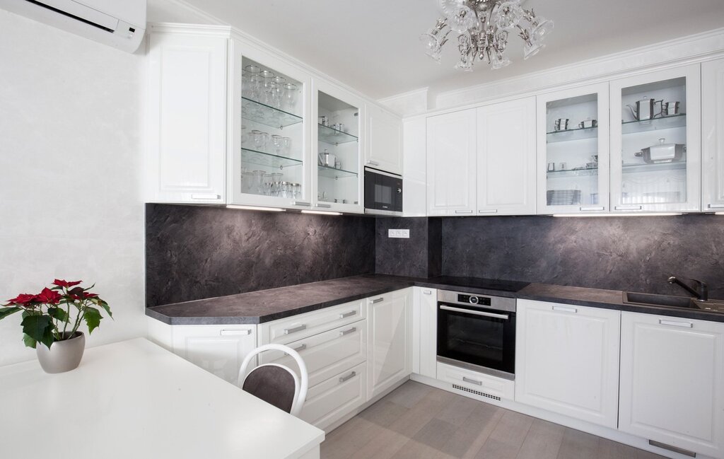 White kitchen with a brown countertop