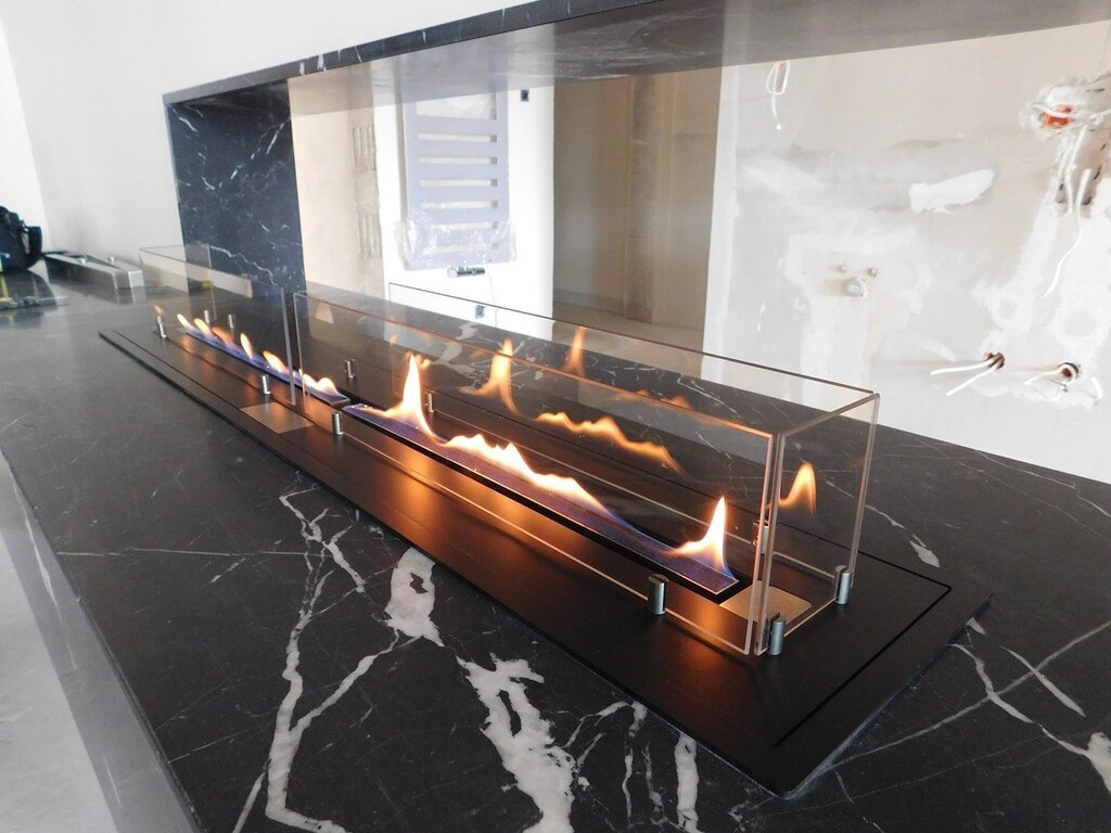 A bio-fireplace built into furniture