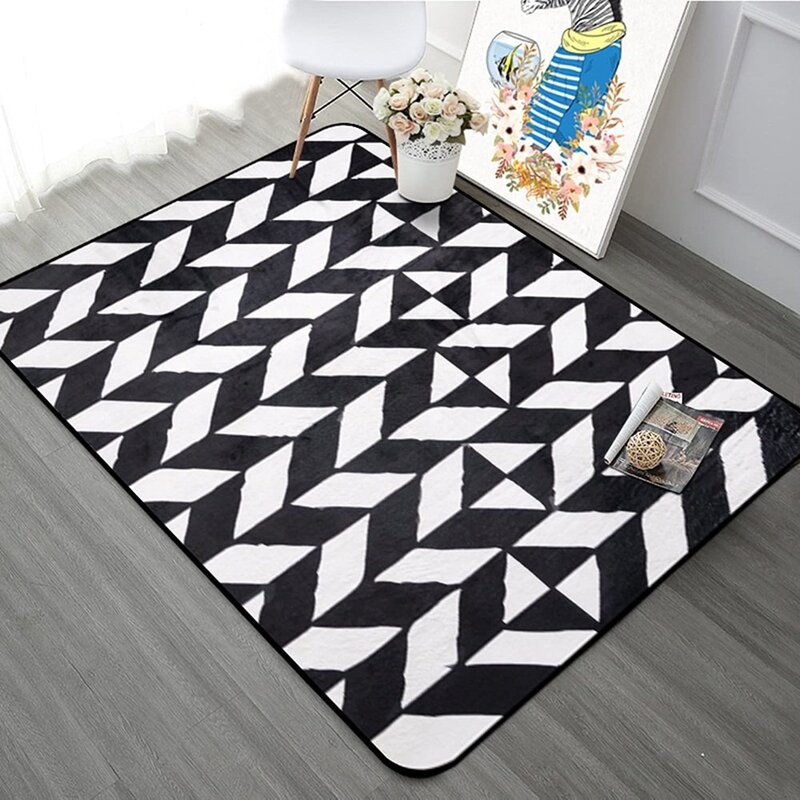 Black and white carpet with a geometric pattern