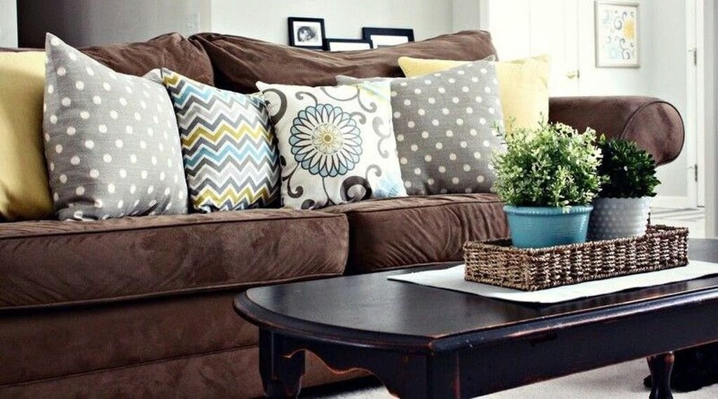 Decorative pillows for a brown sofa