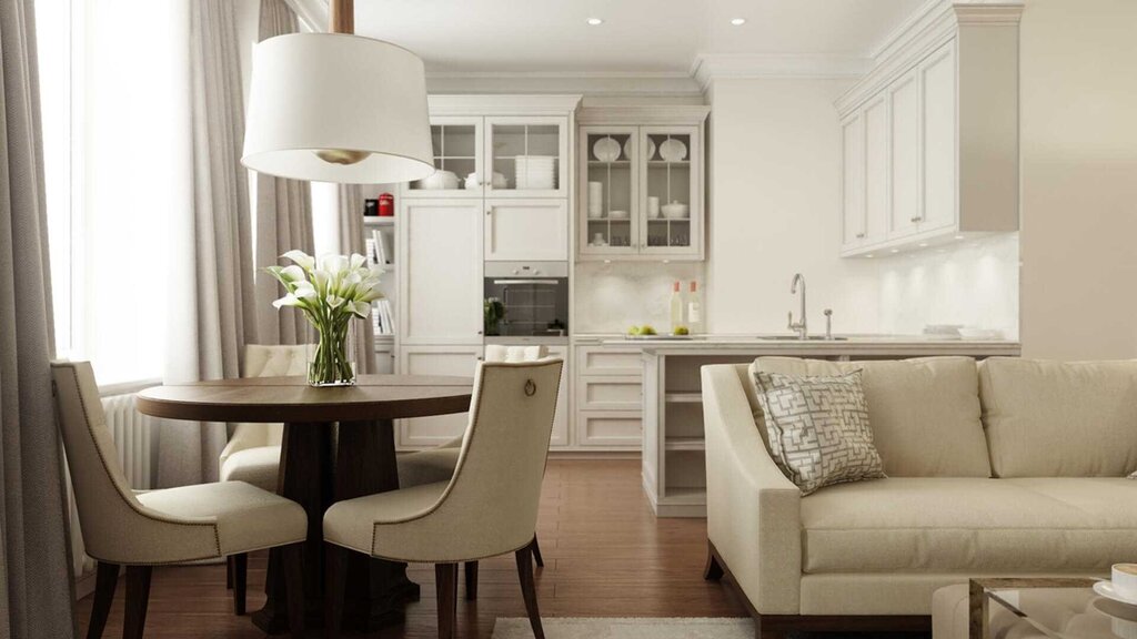 A sofa by the window in the kitchen-living room