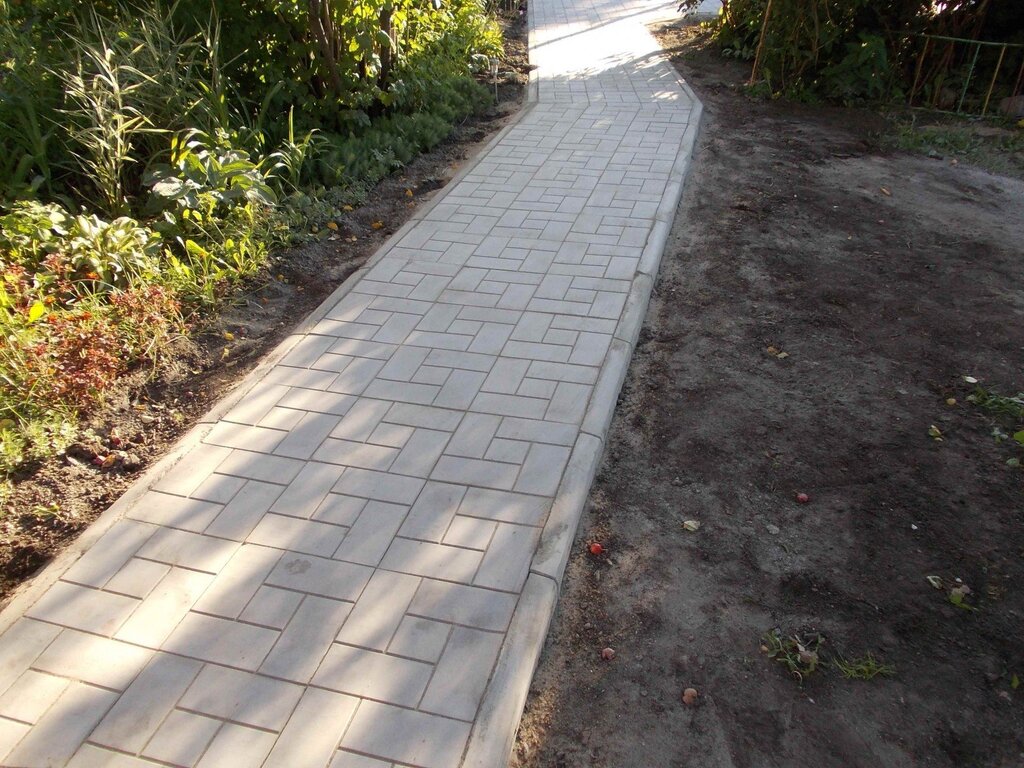 Pathways in the garden made of paving tiles