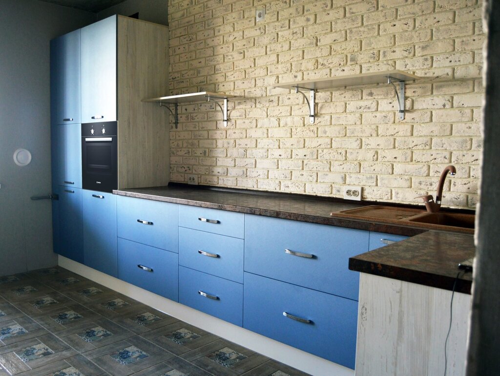 Blue kitchen without upper cabinets