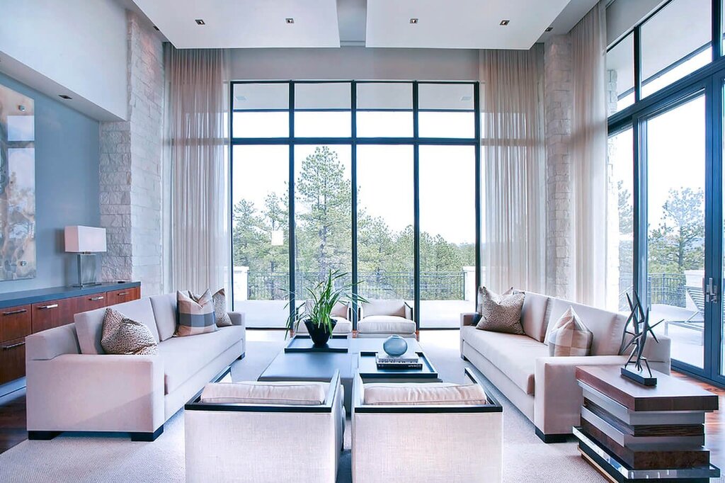 The living room with floor-to-ceiling windows