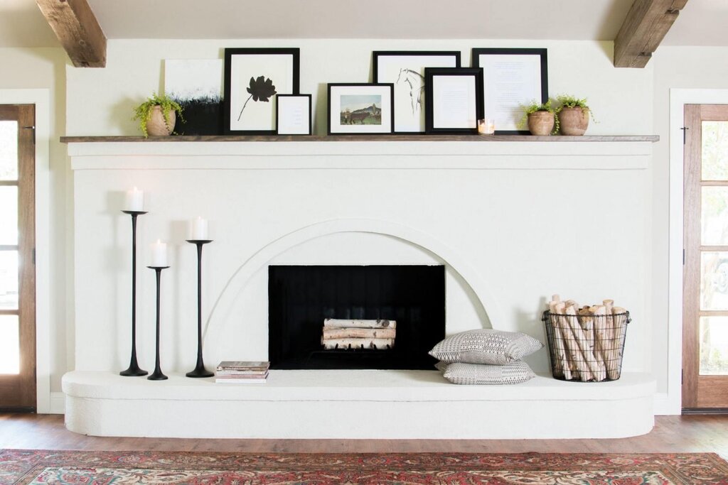 Imitation of a fireplace in the living room interior