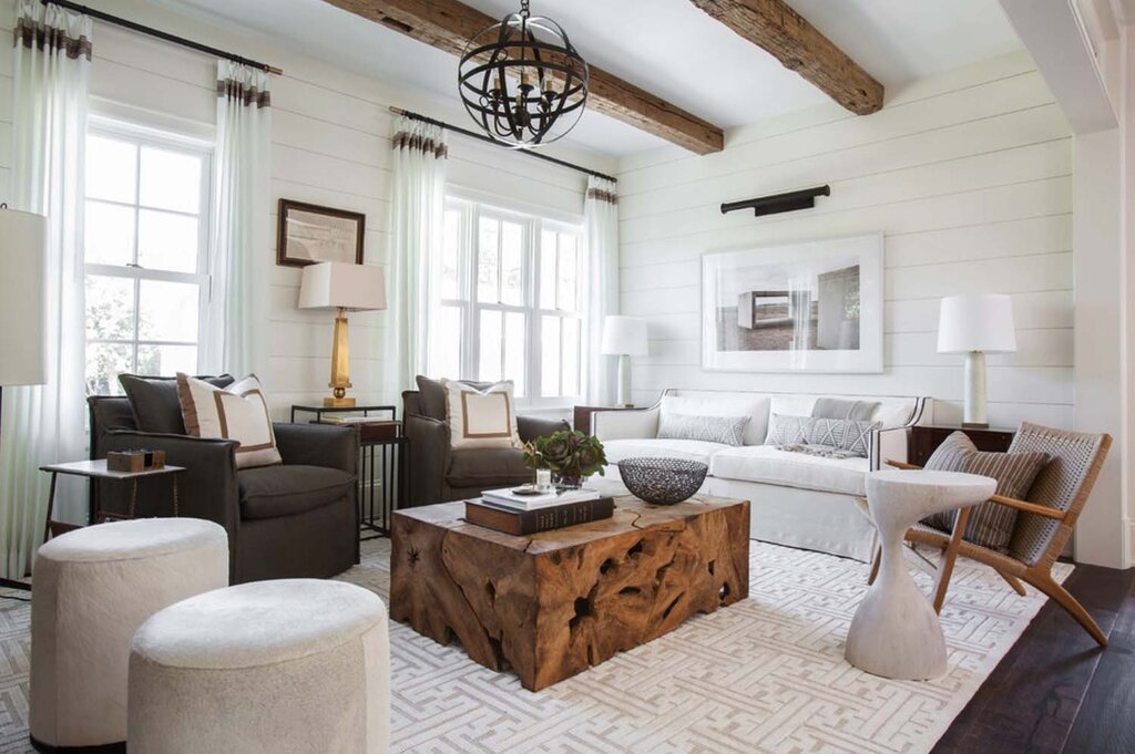 The interior of a wooden house with white walls