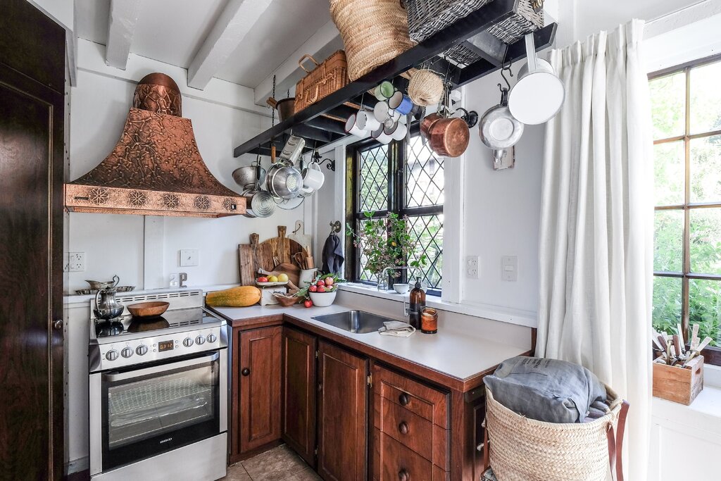 The interior of a small kitchen in a country house