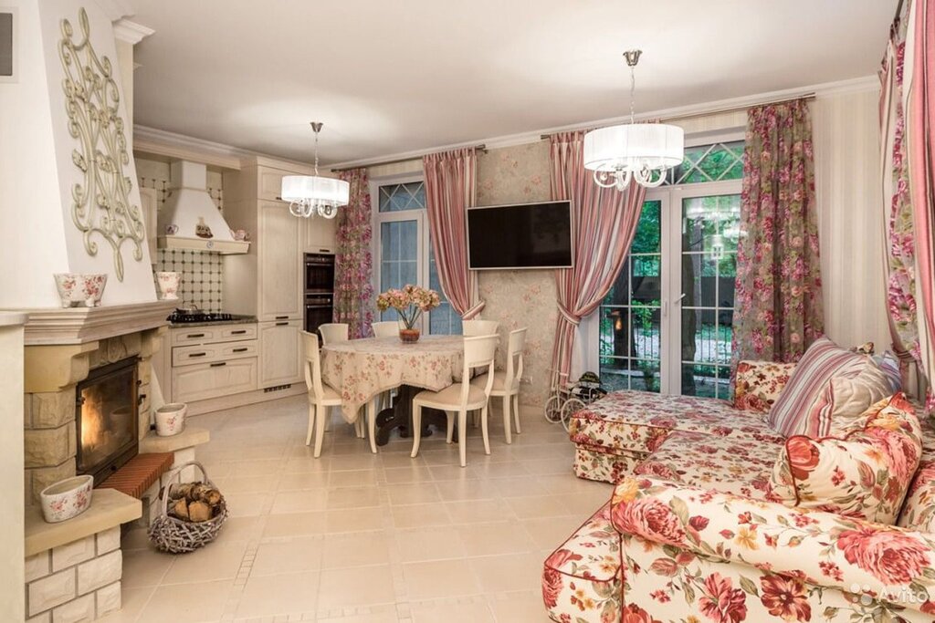 Interiors of the kitchen-living room in a country house