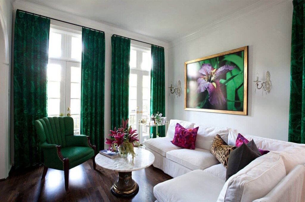 Emerald curtains in the living room interior