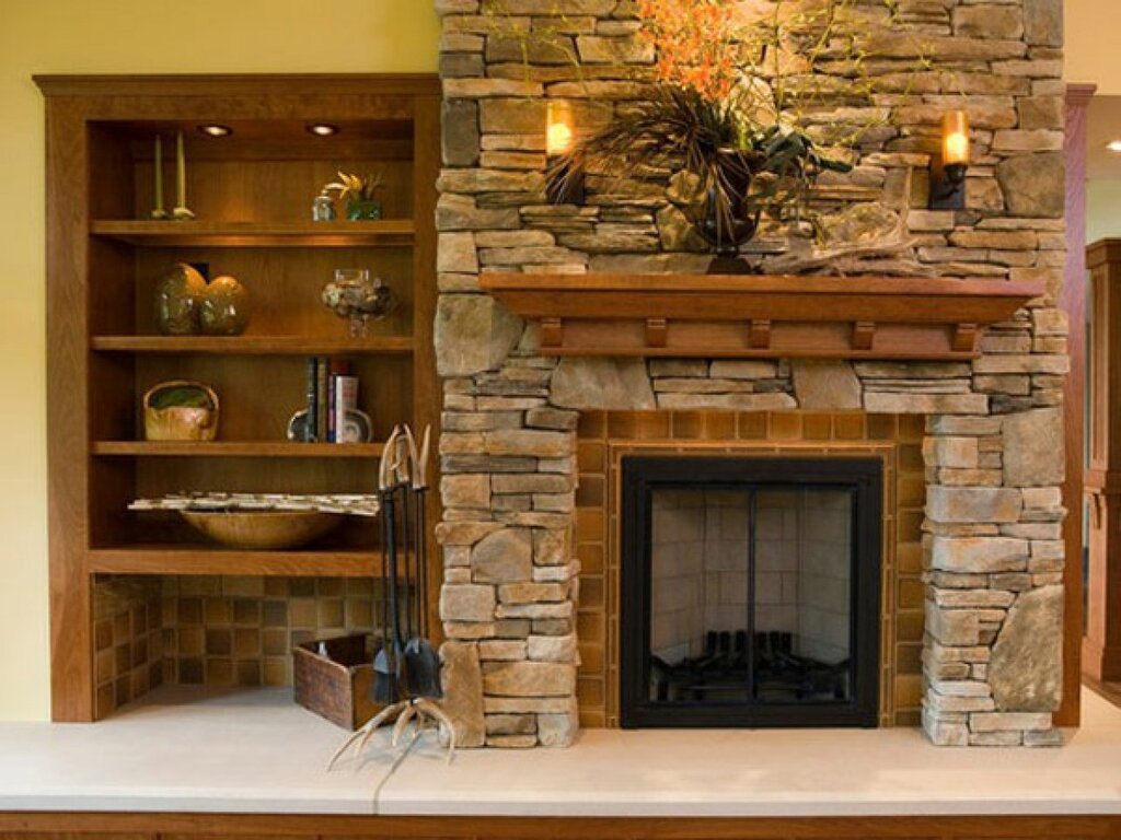 A fireplace made of decorative stone with your own hands