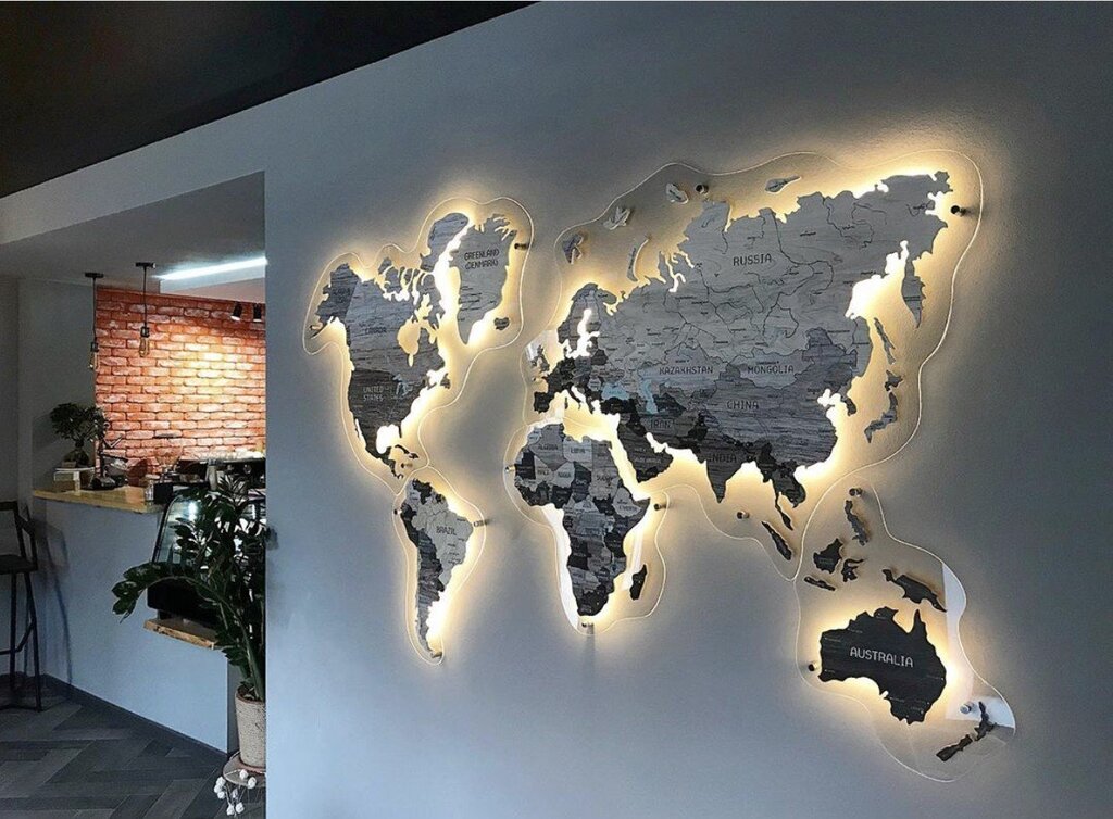 Wooden map on the wall with backlighting