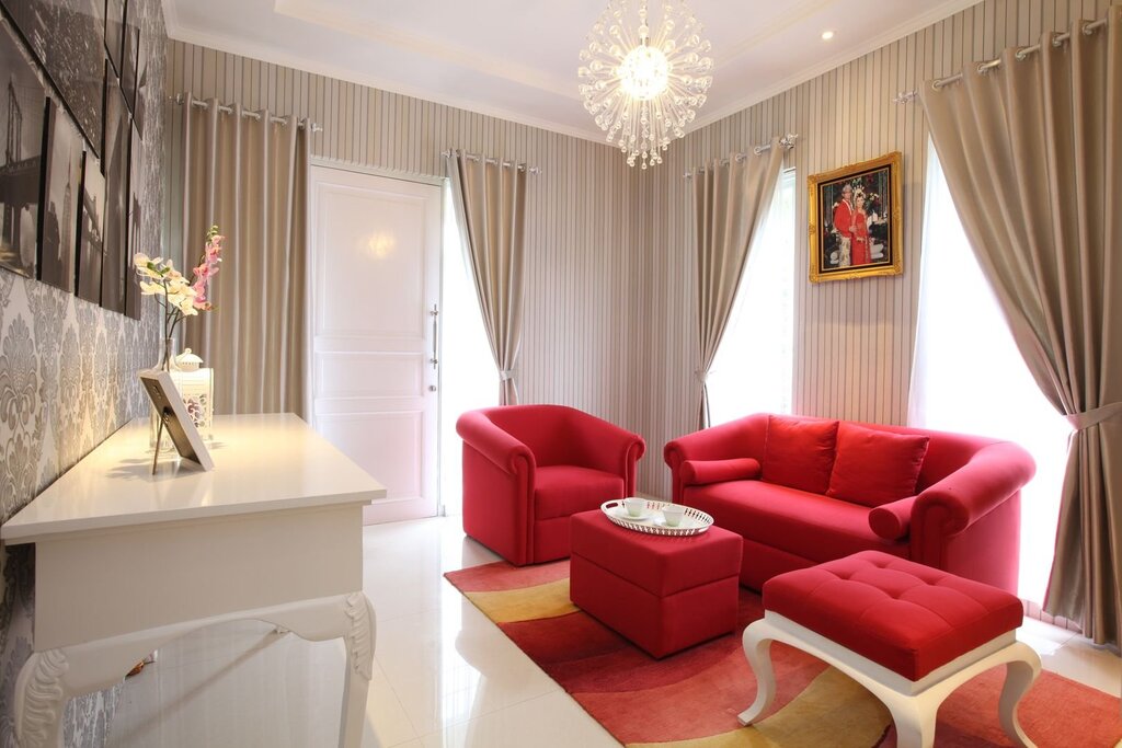 A classic living room with red curtains