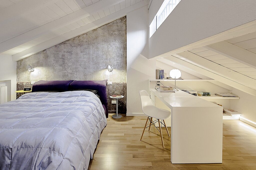 A room with a slanted ceiling