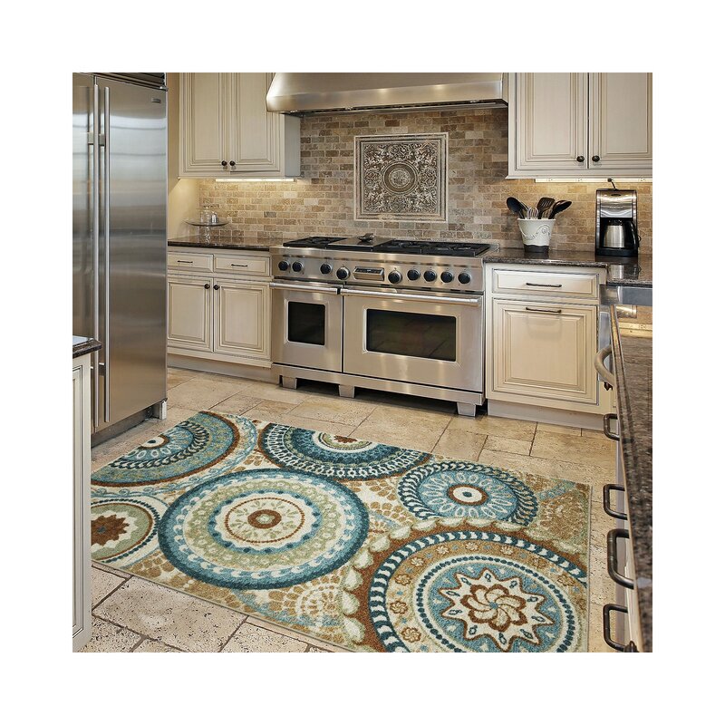 A tile rug in the kitchen