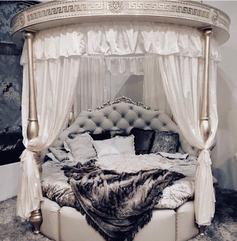 Round bed with a canopy