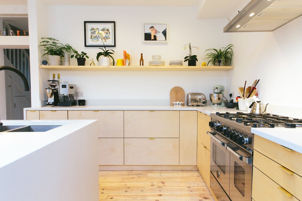 A kitchen without wall cabinets with shelves