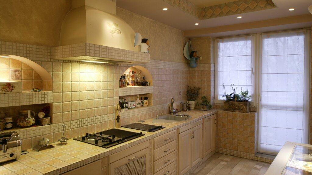 Kitchen made of drywall and tiles