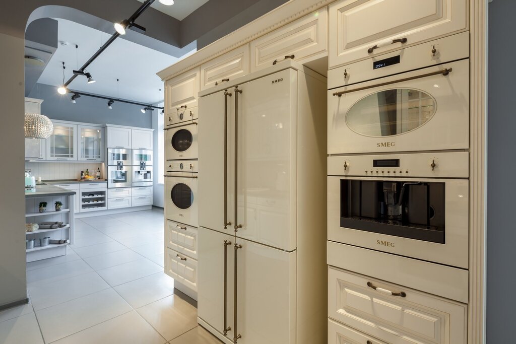 Kitchen with a beige refrigerator