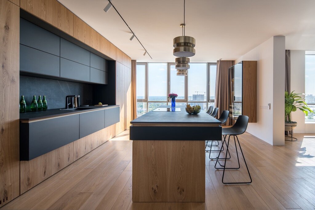 A kitchen with an island in Minimalist style