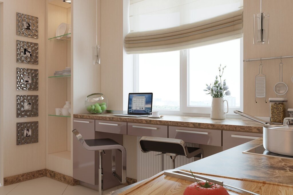 A kitchen with a countertop by the window