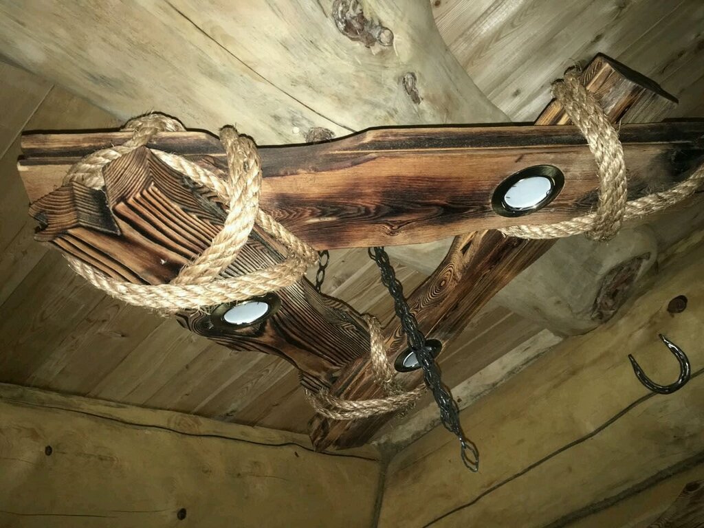 Chandelier made of aged wood