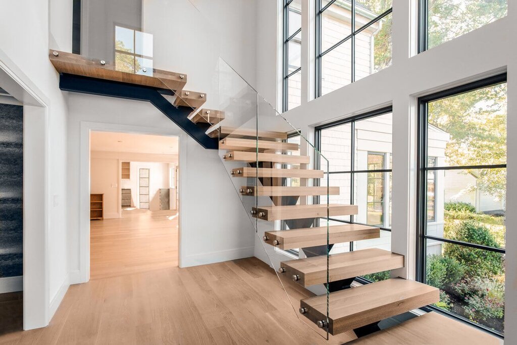 A metal staircase with wooden steps