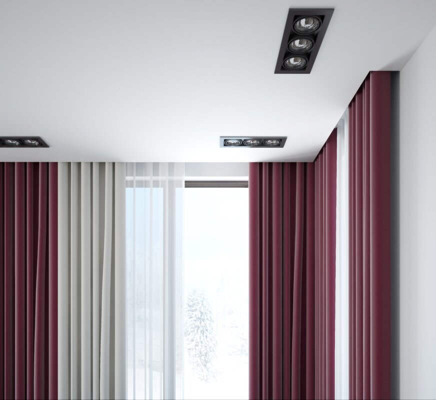 Stretch ceiling with a hidden curtain rod