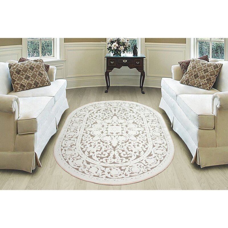 Oval rugs in the living room interior