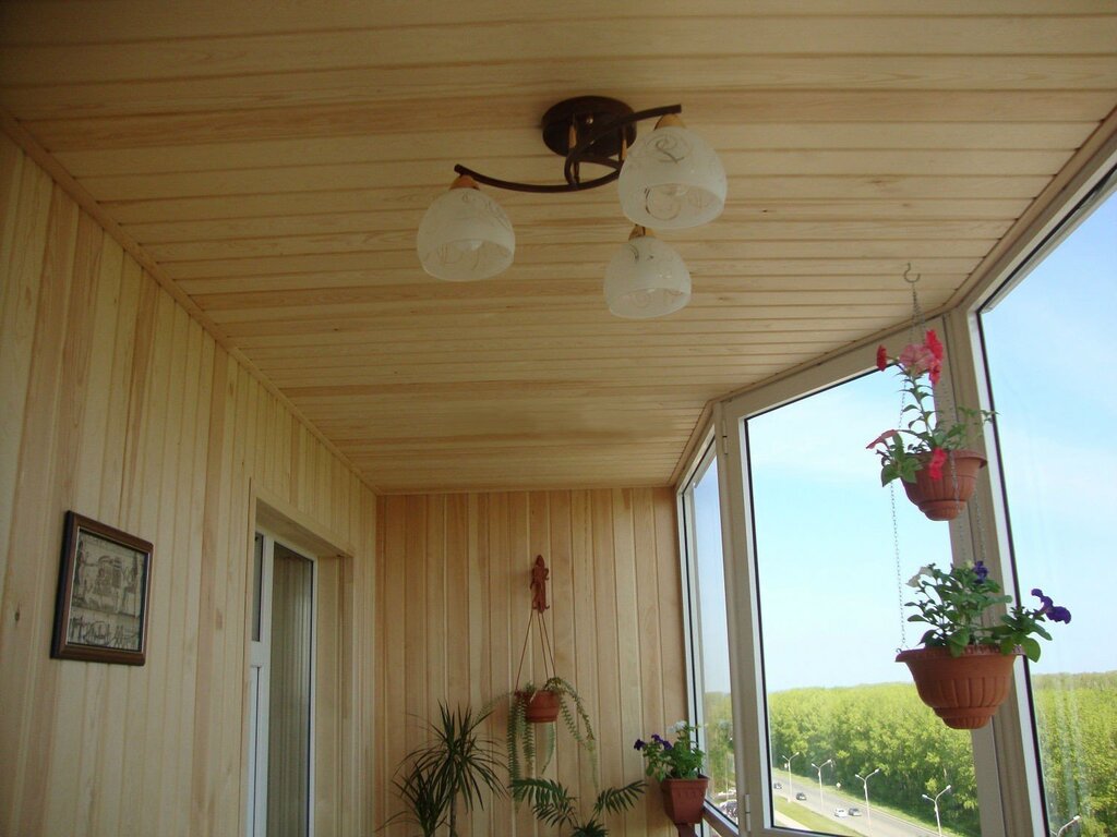 The ceiling made of clapboard on the balcony