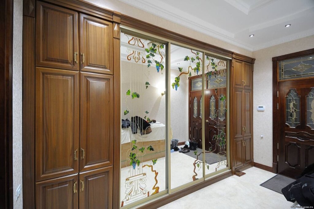 A hallway with hinged doors