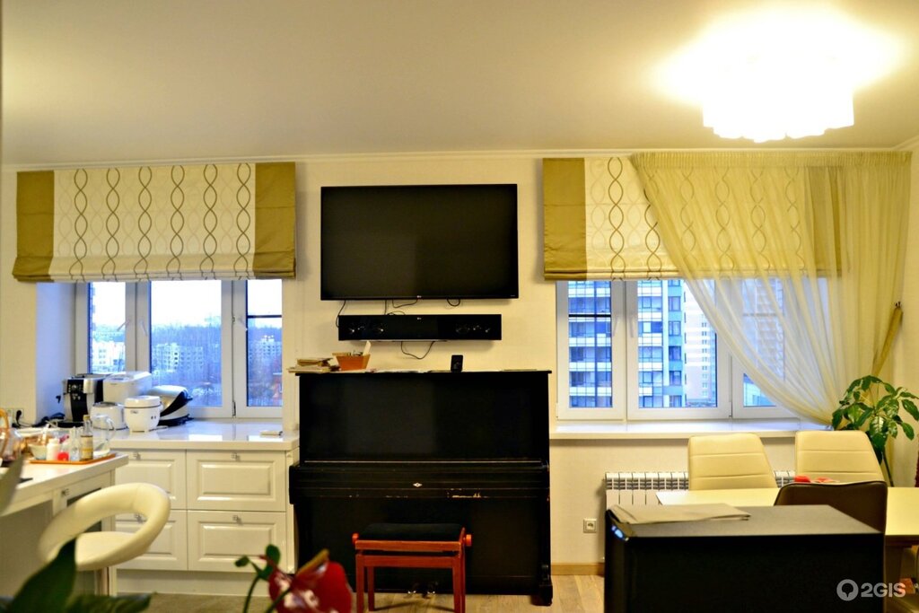 Roman blinds in the kitchen-living room interior