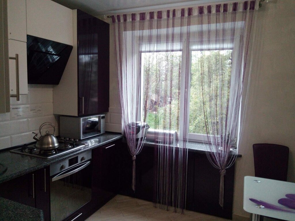 Curtains for the kitchen with a balcony