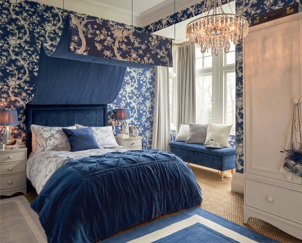 Blue curtains in the bedroom interior