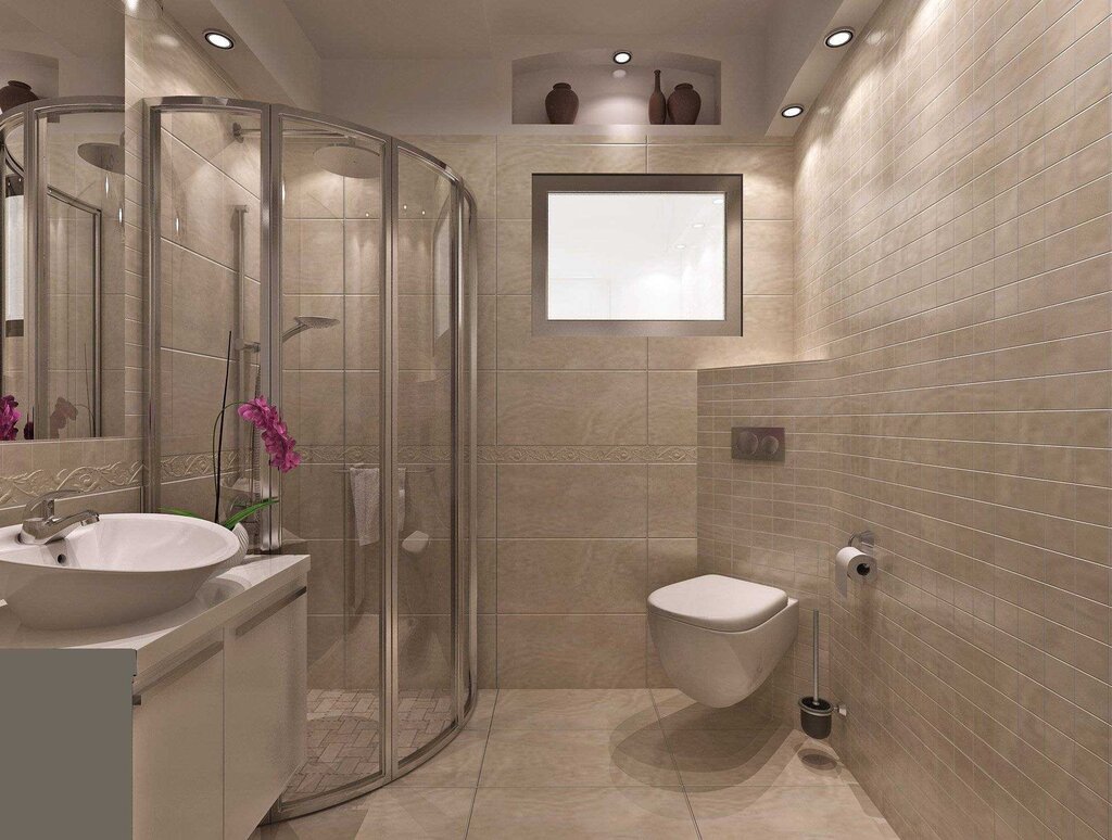 Combined bathroom with a shower cabin