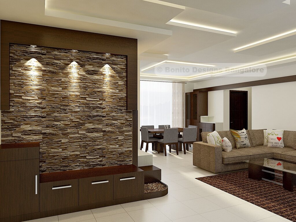 A stone wall in the living room interior