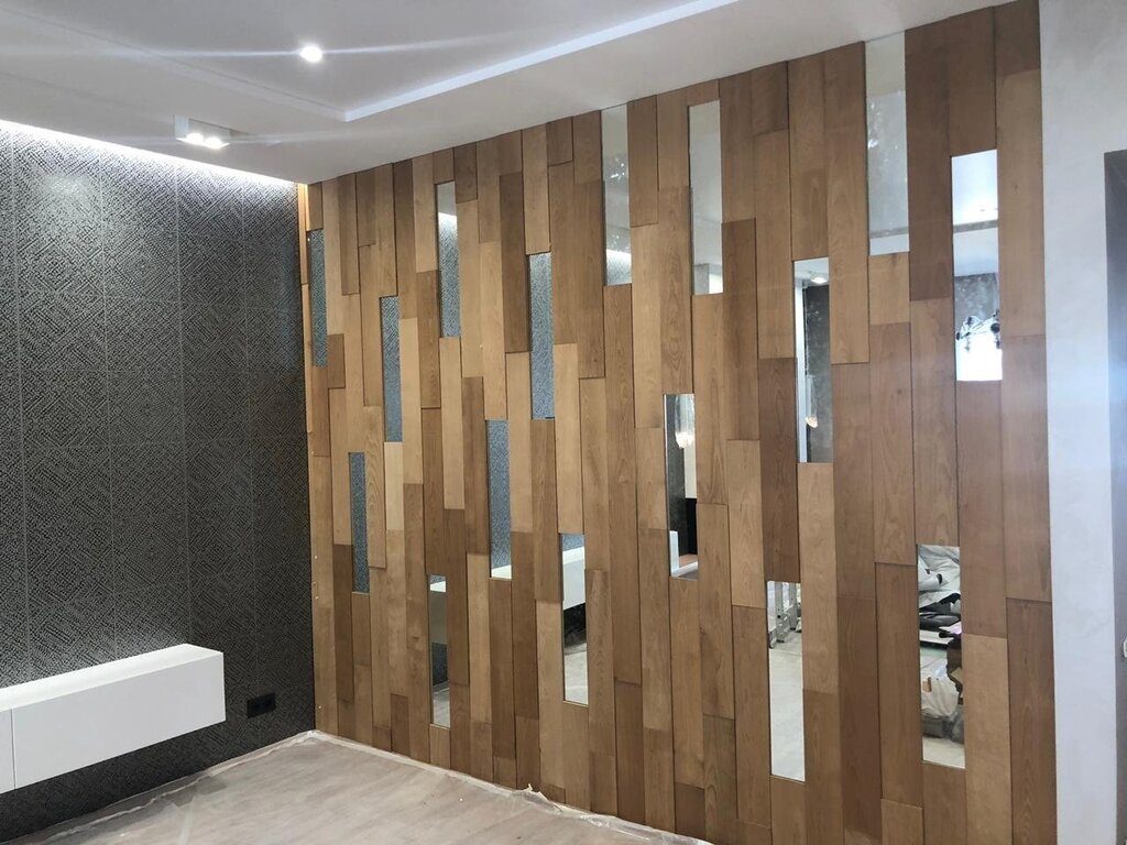 Wall panels with mirrored inserts