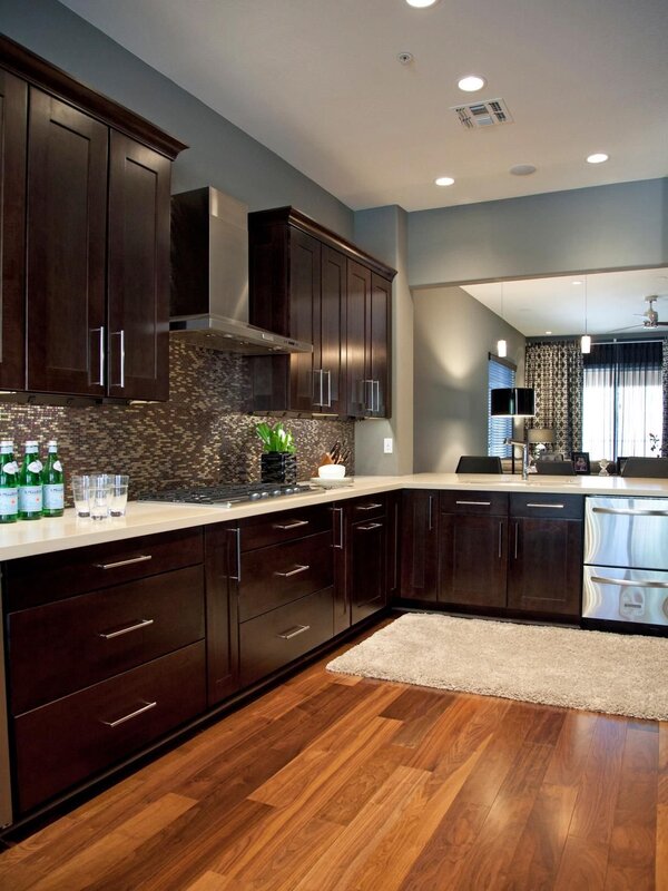 Dark brown kitchen in the interior