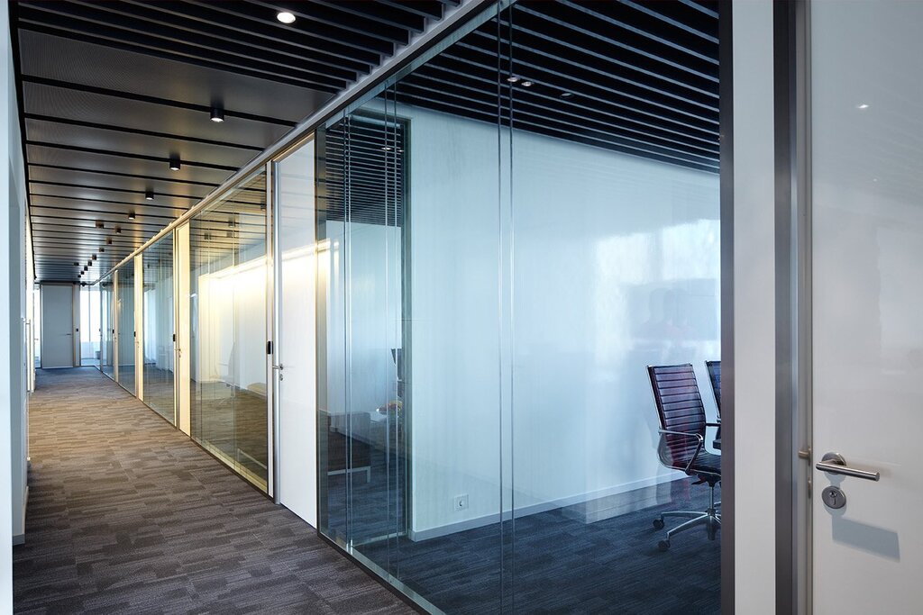 All-glass partition with a door