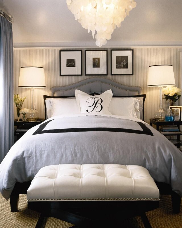 A fan above the bed in the bedroom