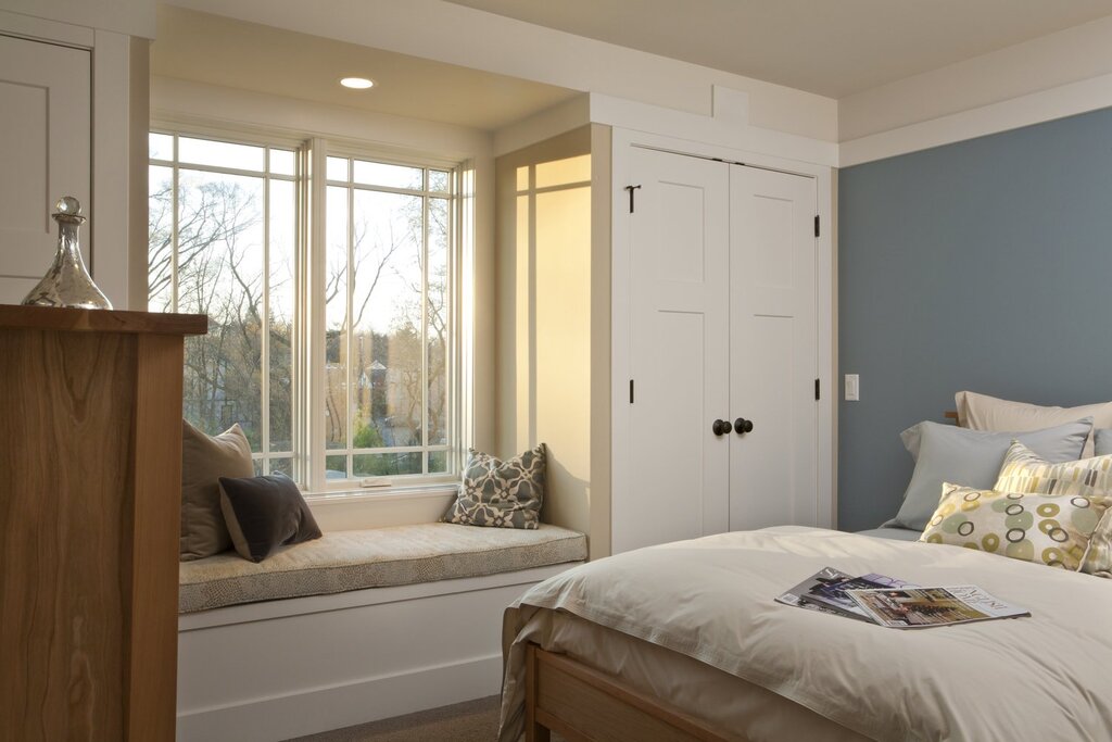 Built-in wardrobe by the window in the bedroom