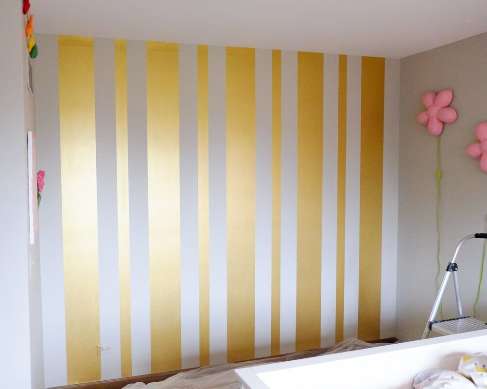 Golden stripes on the wall